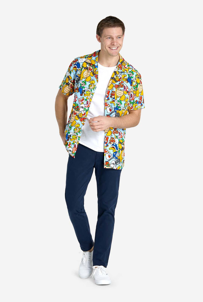 Man wearing Hawaiian shirt with Super Mario Icons