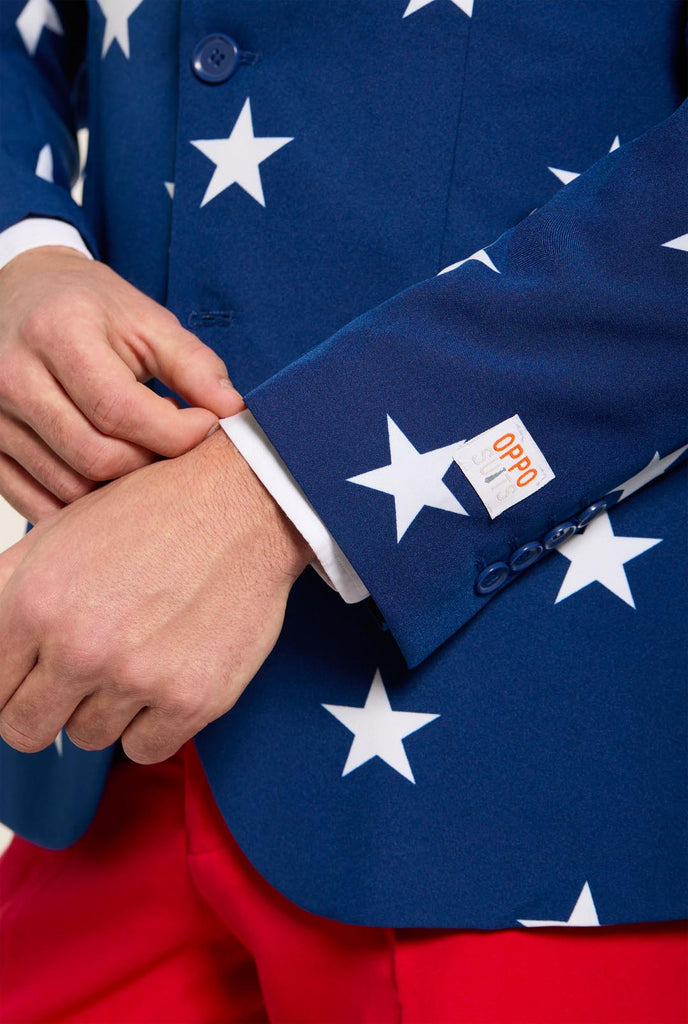 Man wearing red and blue USA themed suit for 4th of July