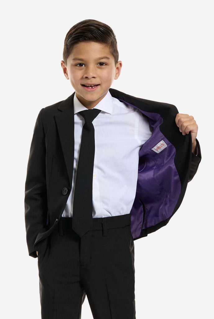 Kid wearing OppoSuits Black suit.