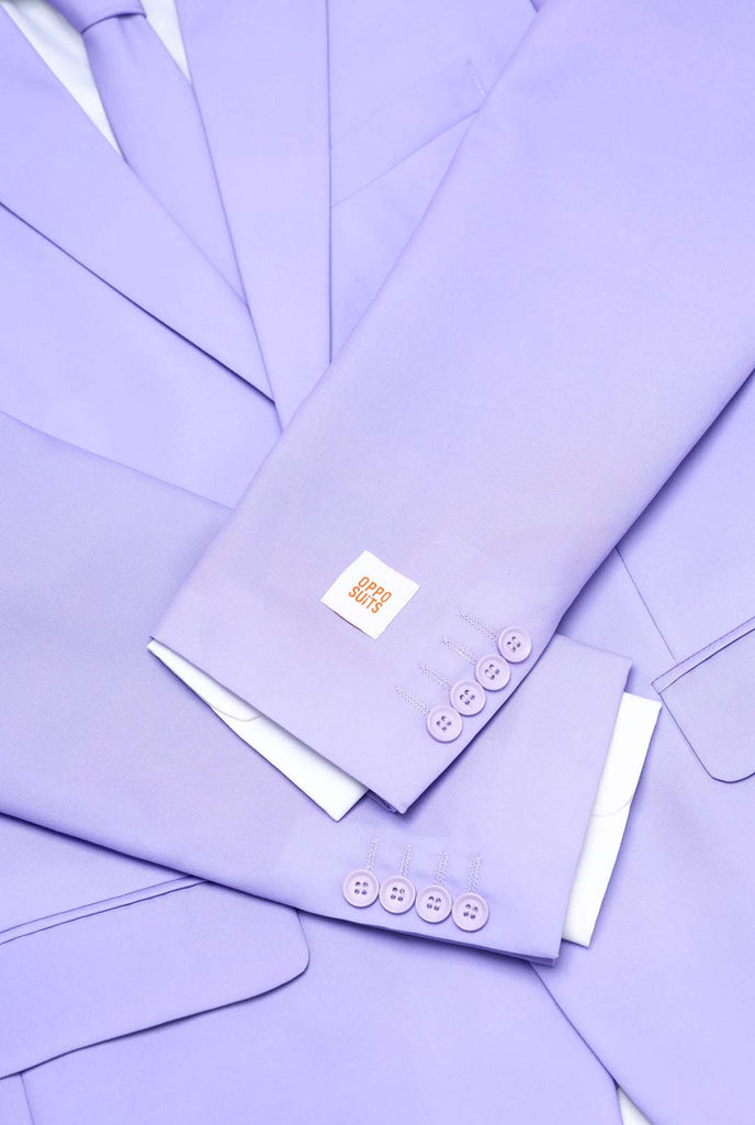 Close up of Lavish Lavender mens suit. Lavender purple colored solid colored mens suit.