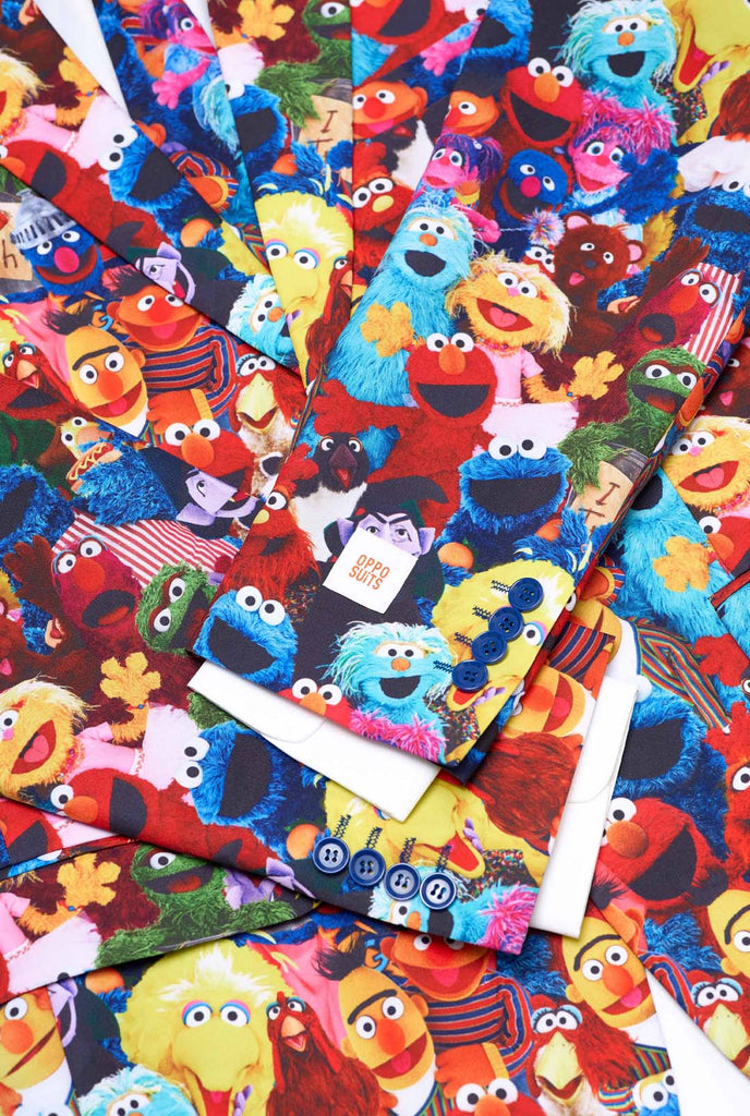 Close up of Sesame Street mens suit. Suit with Sesame Street Characters all-over print.