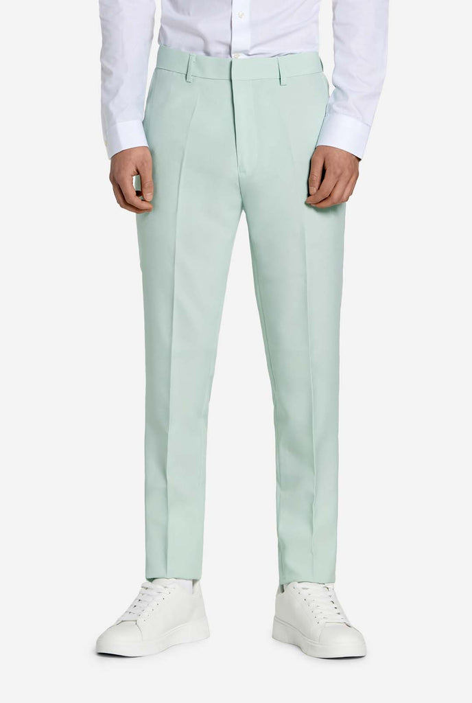 Teen wearing mint green teen boys suit, pants view.