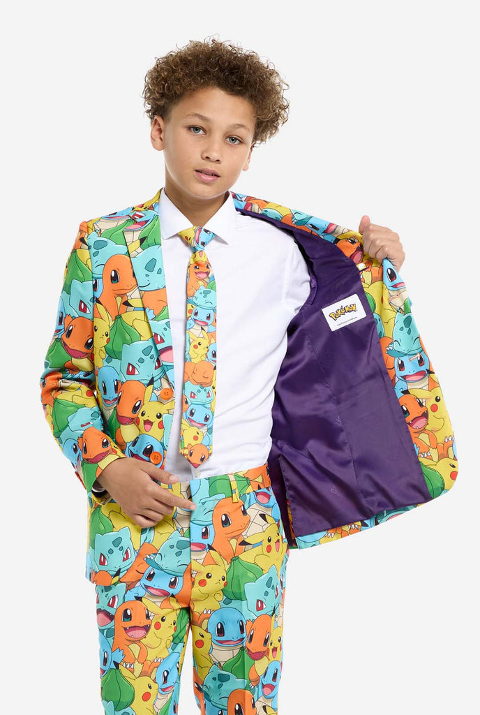 Teen wearing formal multi color suits with Pokemon print