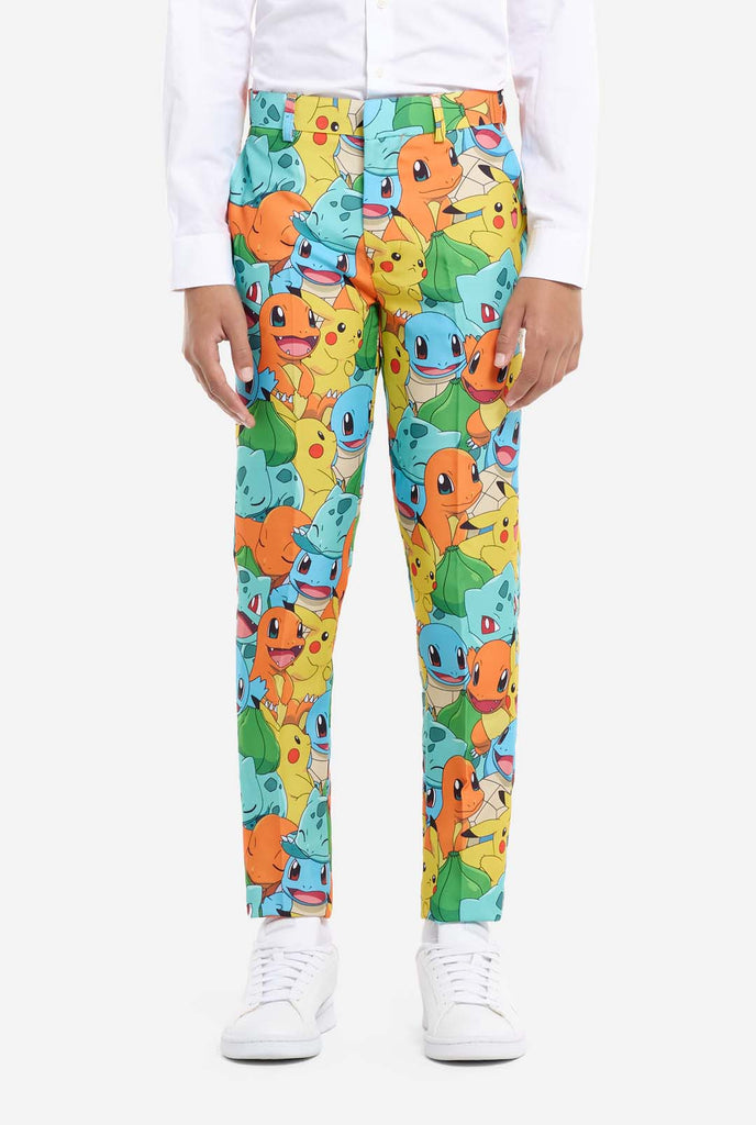 Teen wearing formal multi color suits with Pokemon print, pants view