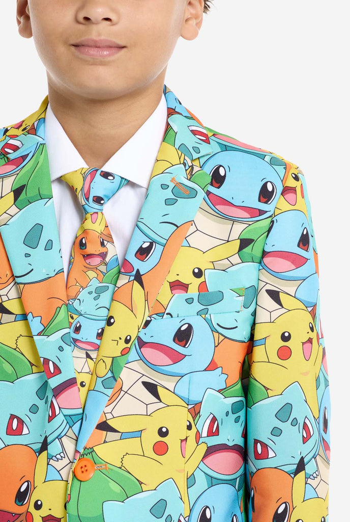 Teen wearing formal multi color suits with Pokemon print, close up