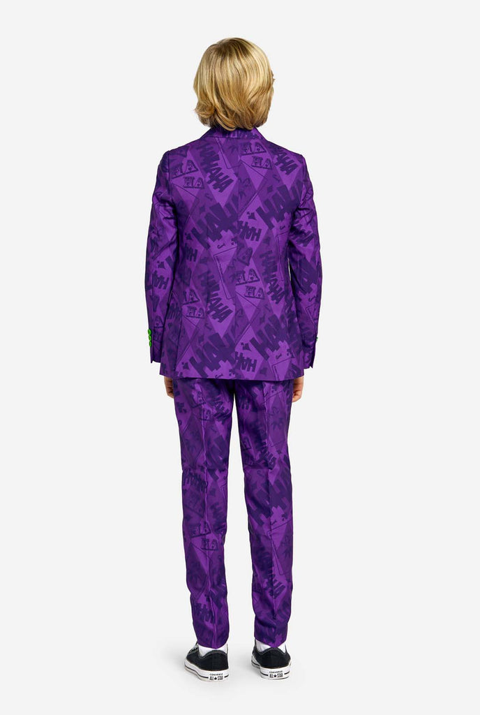 Teen wearing purple teen boys suit with a The Joker theme. Showing the back side of the suit.