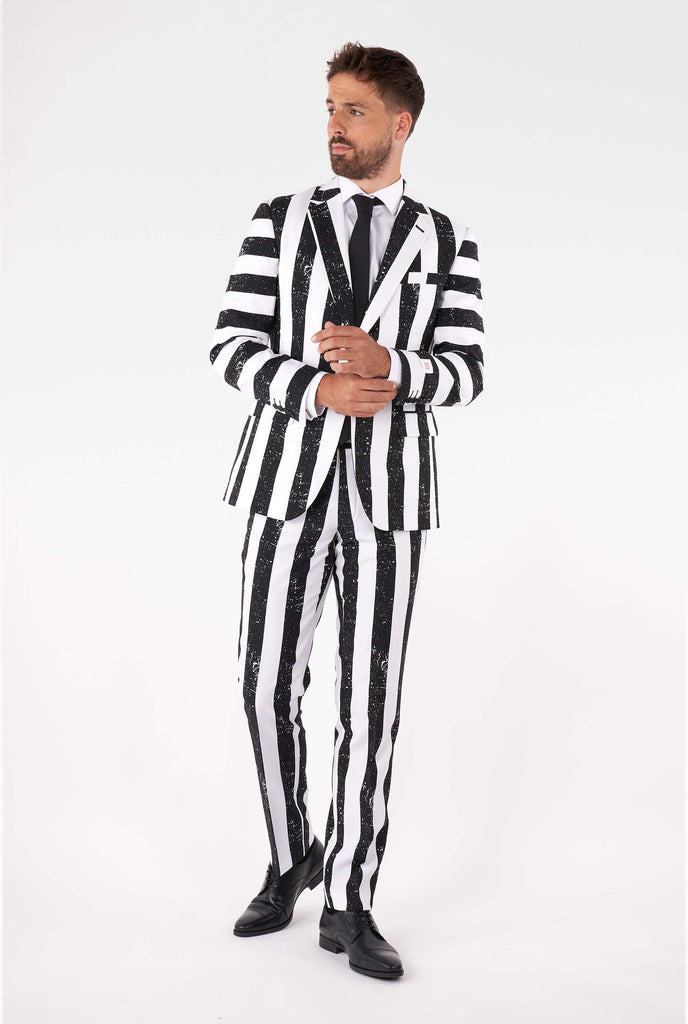 Man wearing striped black and white Beetlejuice men's suit