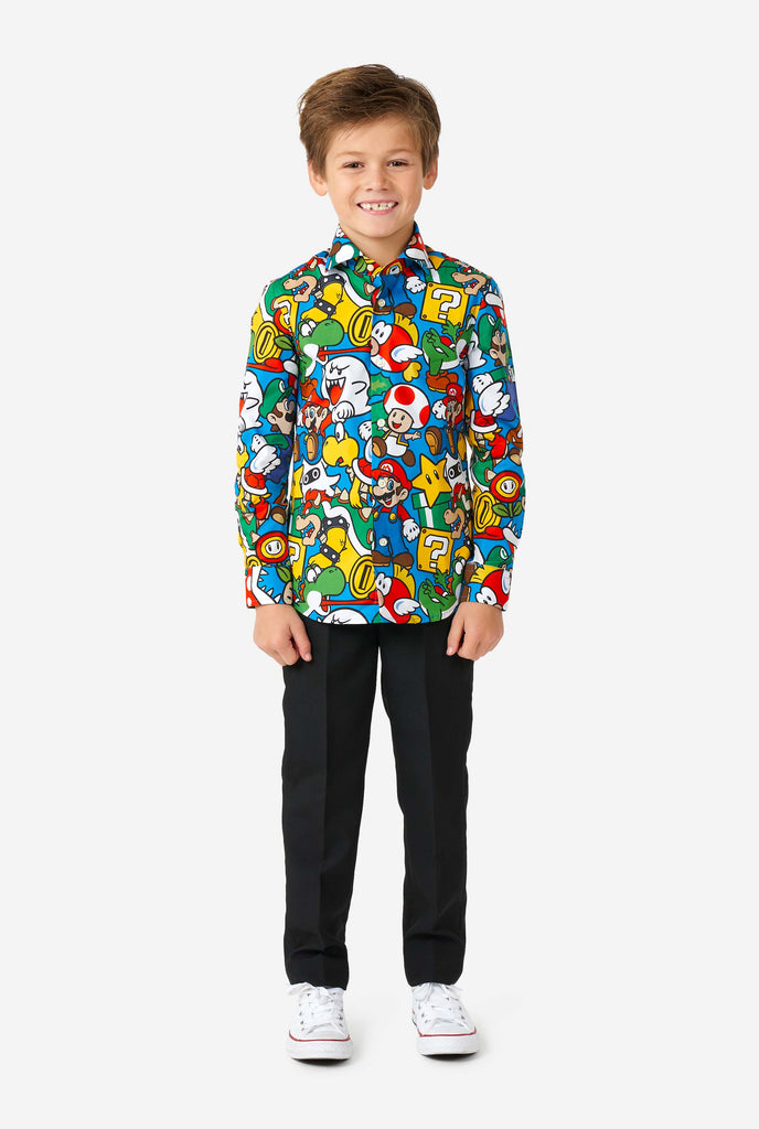 Boy wearing colorful long sleeve shirt with Super Mario Nintendo print