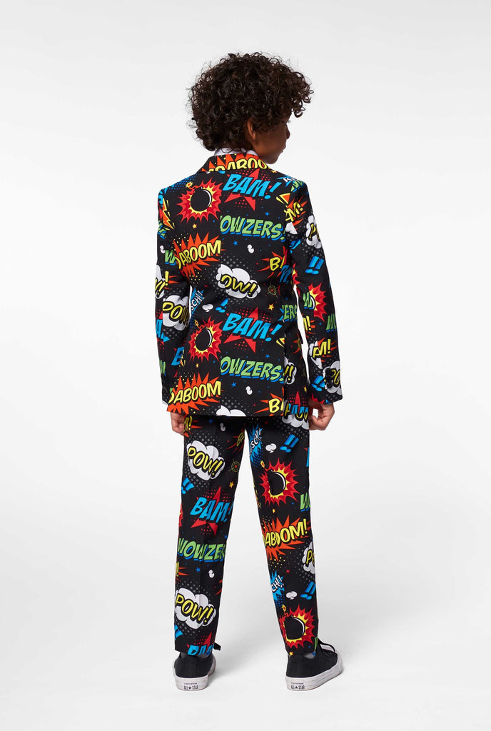 Comic book phrase suit for boys worn by a boy view from back