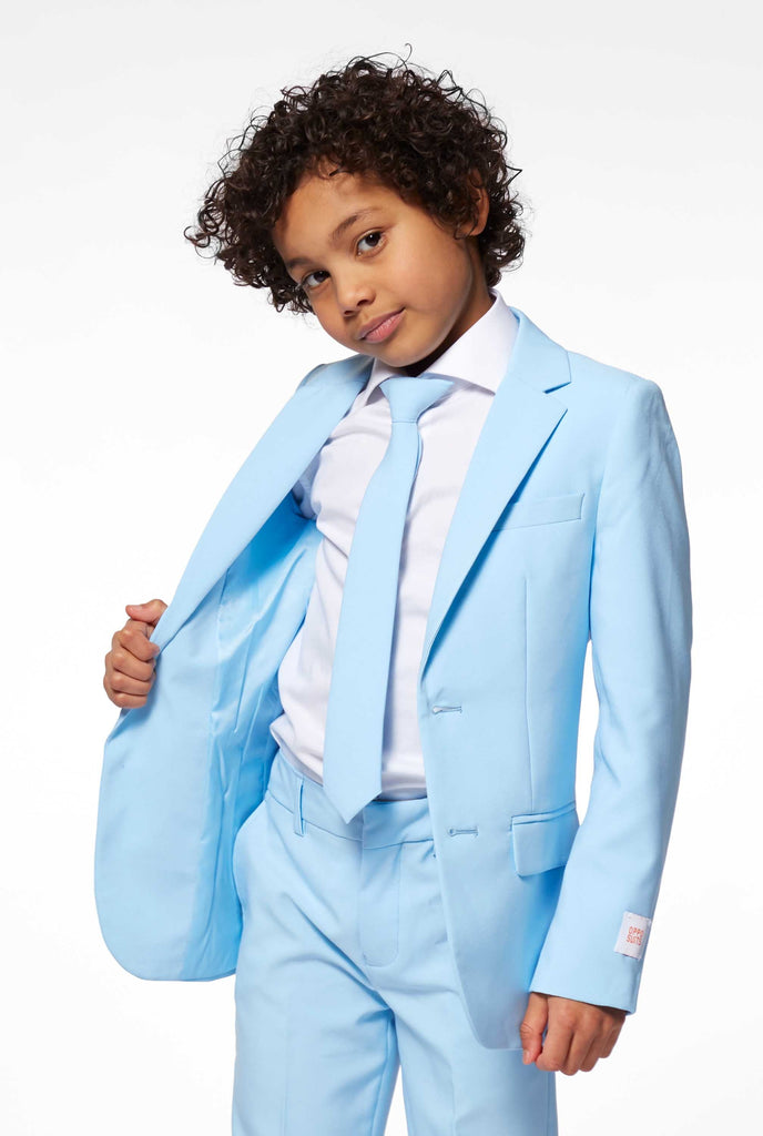 Solid colored light blue suit worn by boy