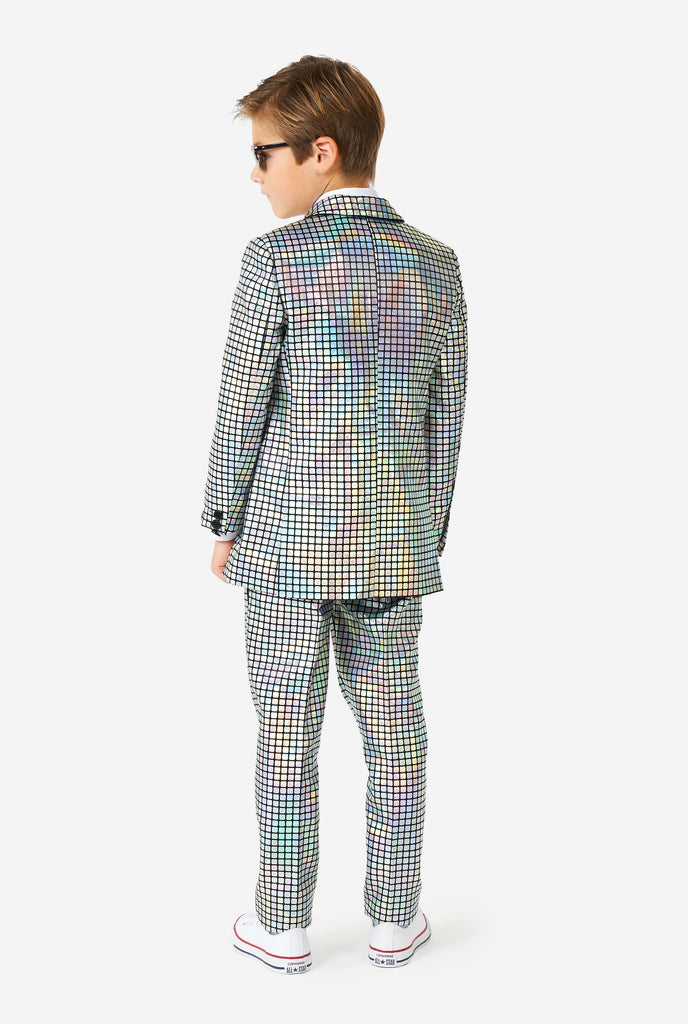 Boy wearing disco ball mirror suit, view from the back