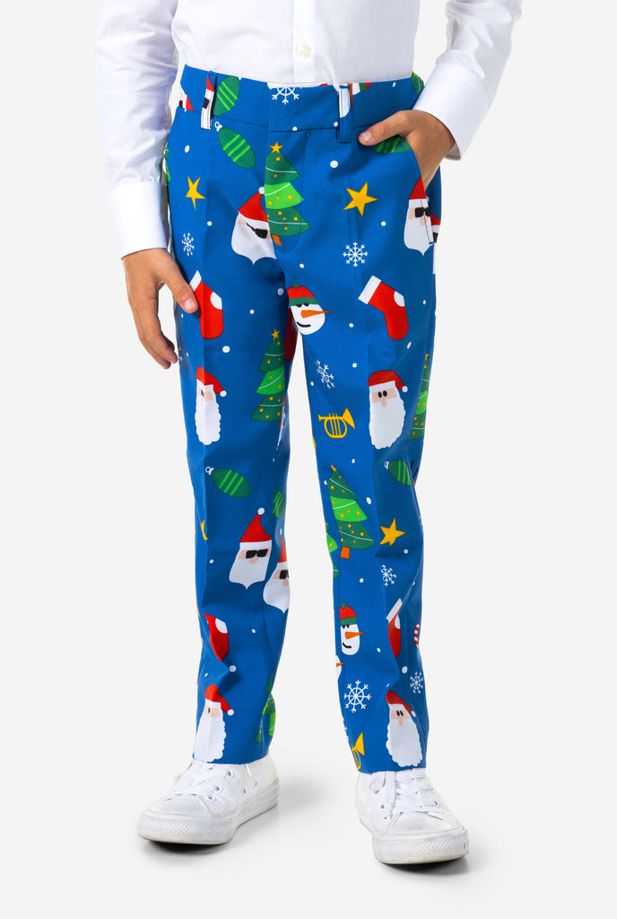 Kid wearing blue Christmas pants with white shirt