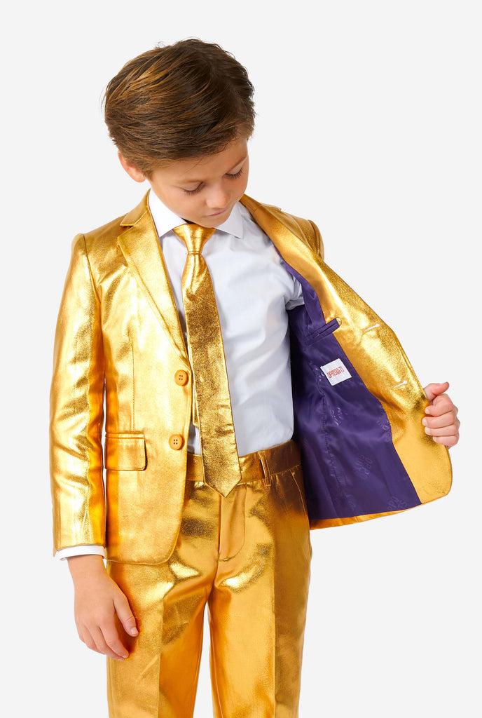 Boy wearing shining gold suit