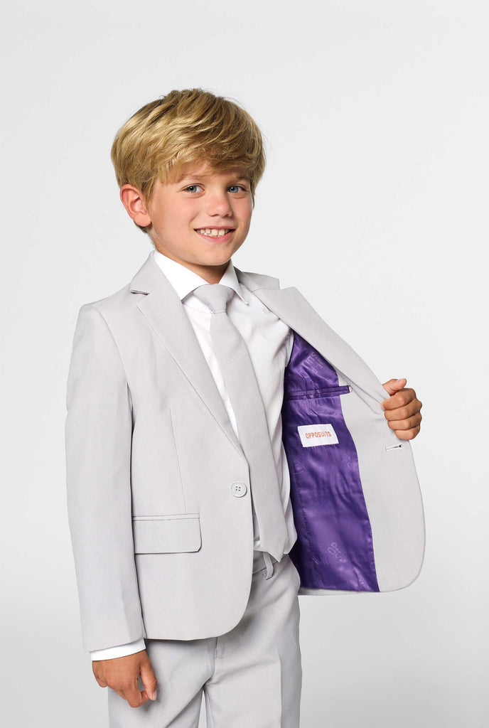 Solid color Groovy Grey suit for kids worn by boy