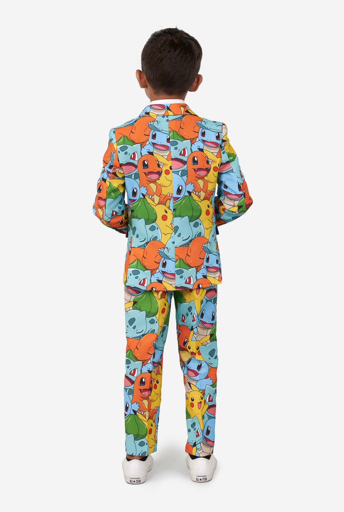 Boy wearing pokemon print suit from the back