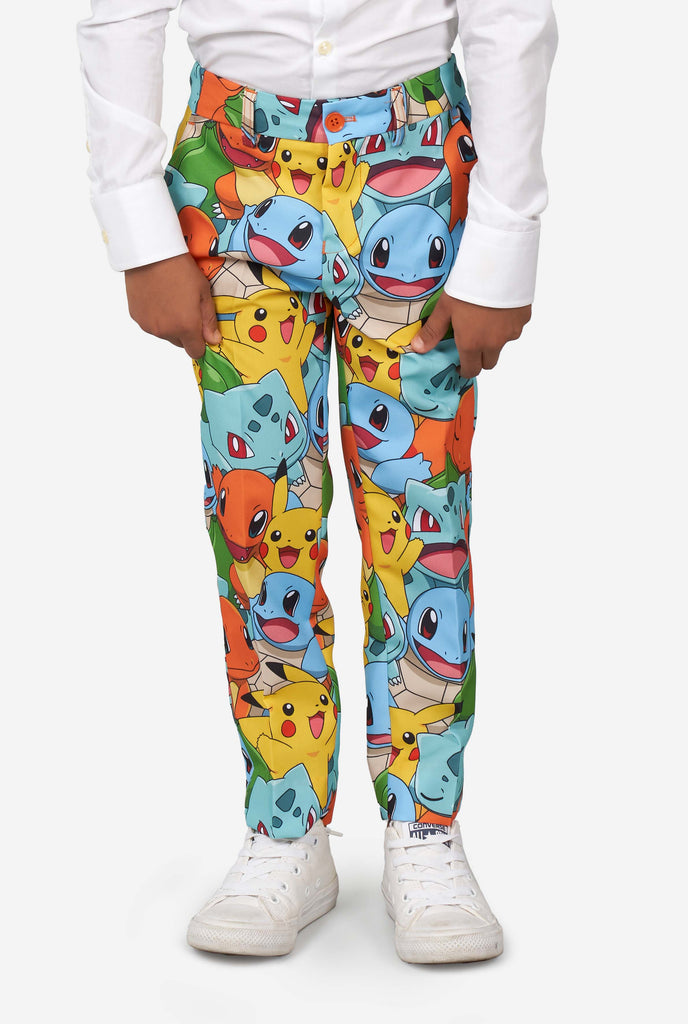 Boy wearing pokemon print suit, pants close up 