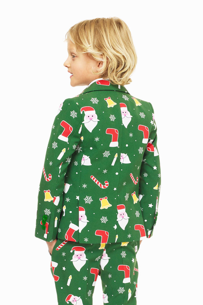Green Christmas suit for boys with Christmas cartoon icons worn by boy from the back
