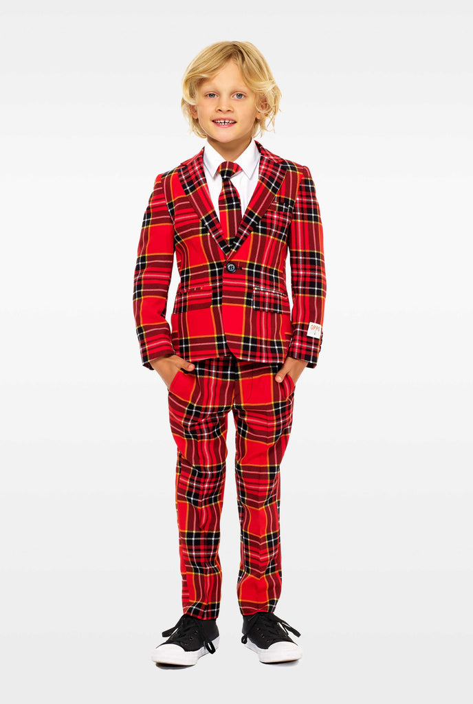 Red plaid suit for boys worn by boy