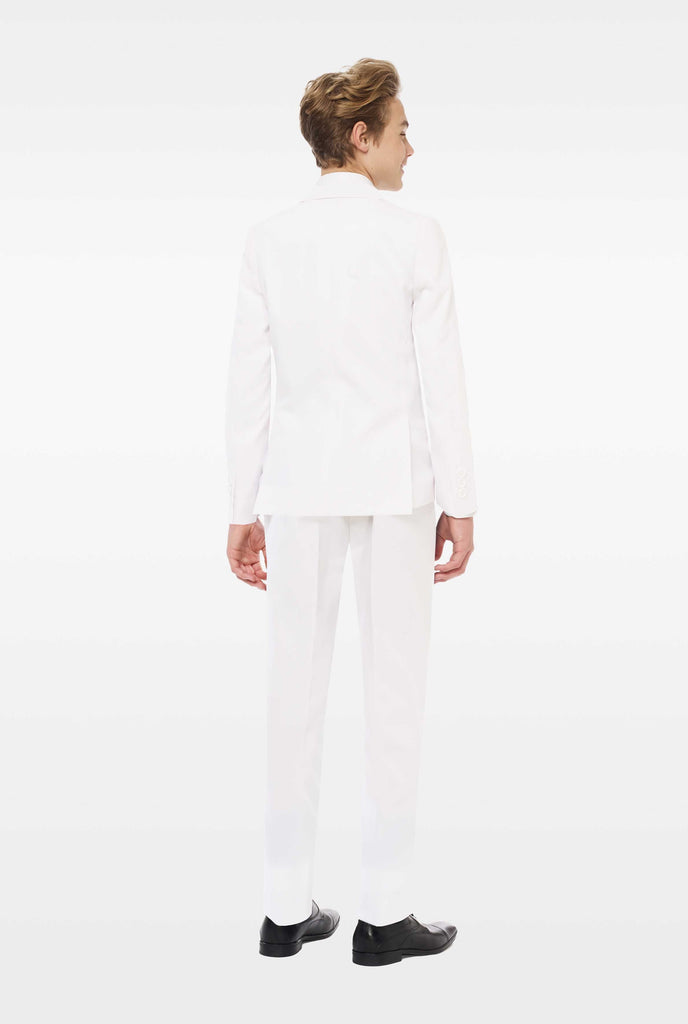 Teen wearing white suit, view from the back