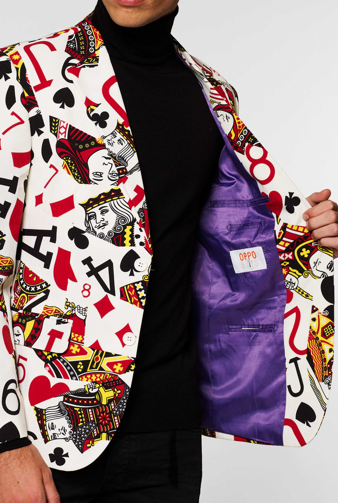 Playing cards print blazer King Of Clubs worn by man inside jacket