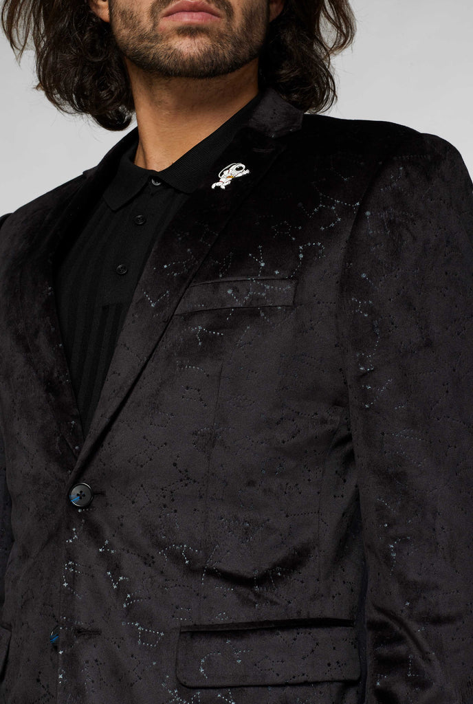 Black jacket with constellation pattern worn by man close up