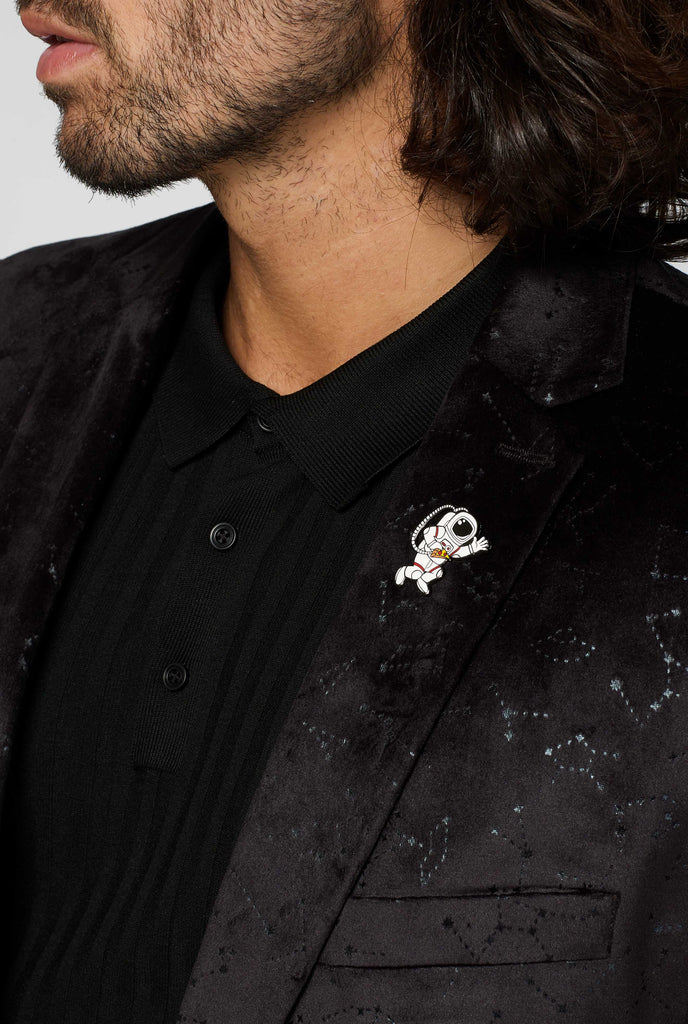 Black jacket with constellation pattern worn by man close up