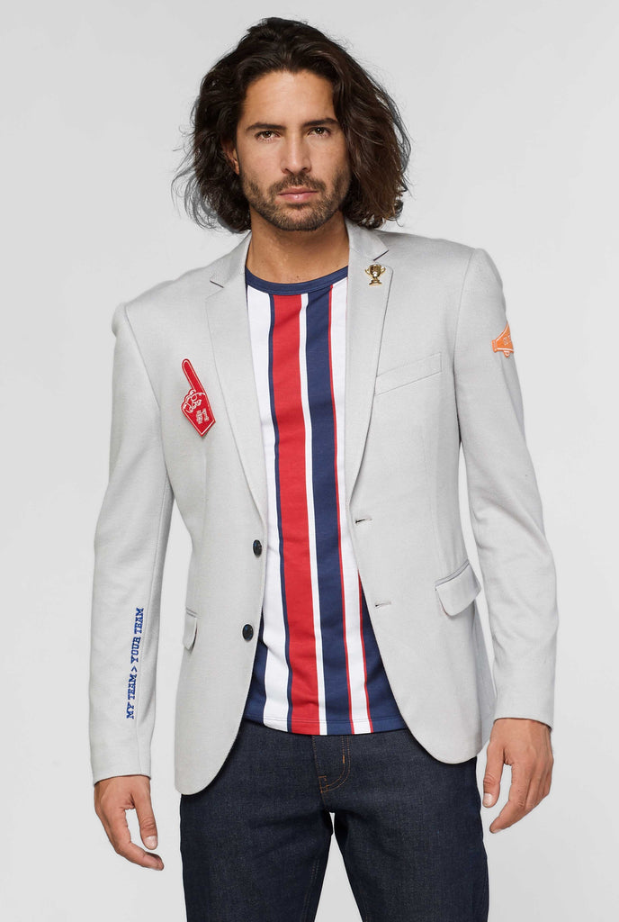 Grey sportswear casual blazer with sports patches worn by man