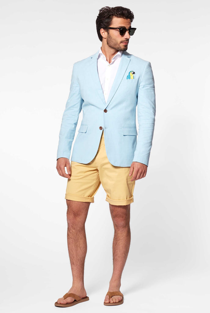 Blue casual blazer with parrot embroidery worn by man