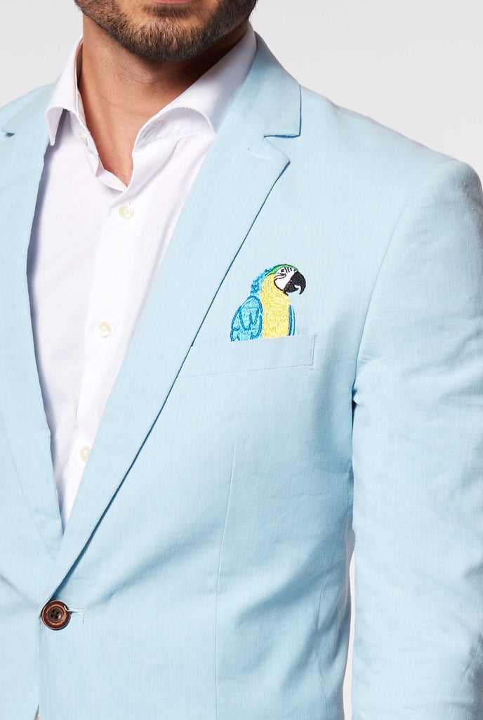 Blue casual blazer with parrot embroidery worn by man, close up