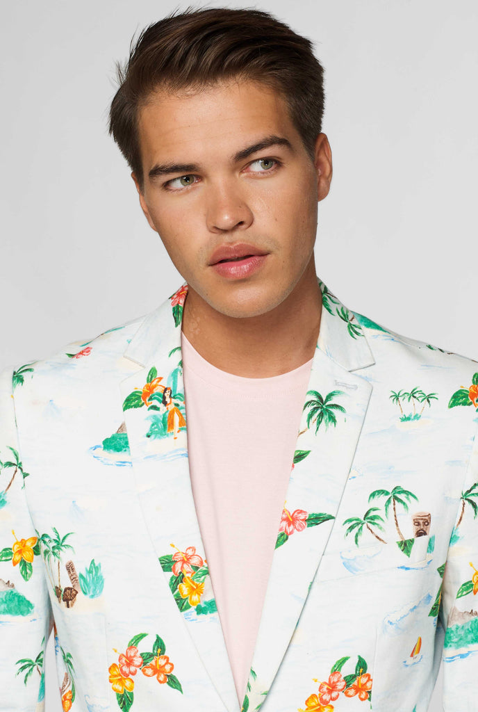 White blazer with Hawaiian icon print worn by man close up