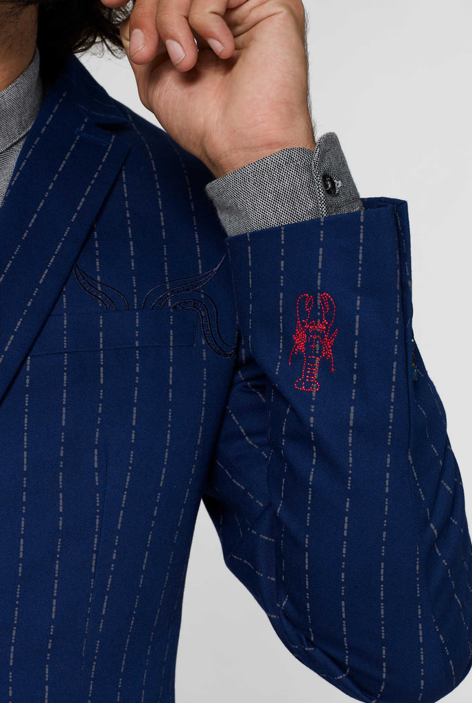 Navy blue captain style pinstripe blazer showing lobster embroidery detail