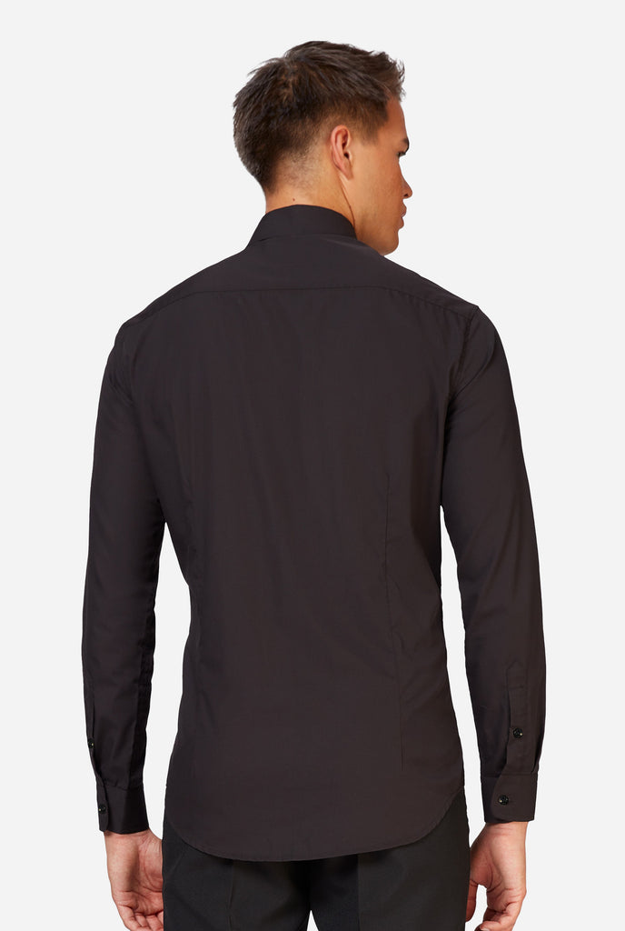 Man wearing black dress shirt, view from the back