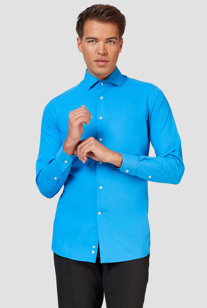 Blue long-sleeve shirt worn by man - close up