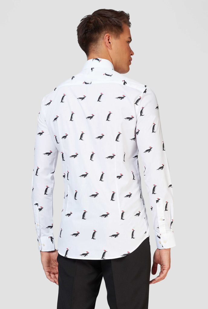 Man wearing white dress shirt with Christmas penguins, view from the back