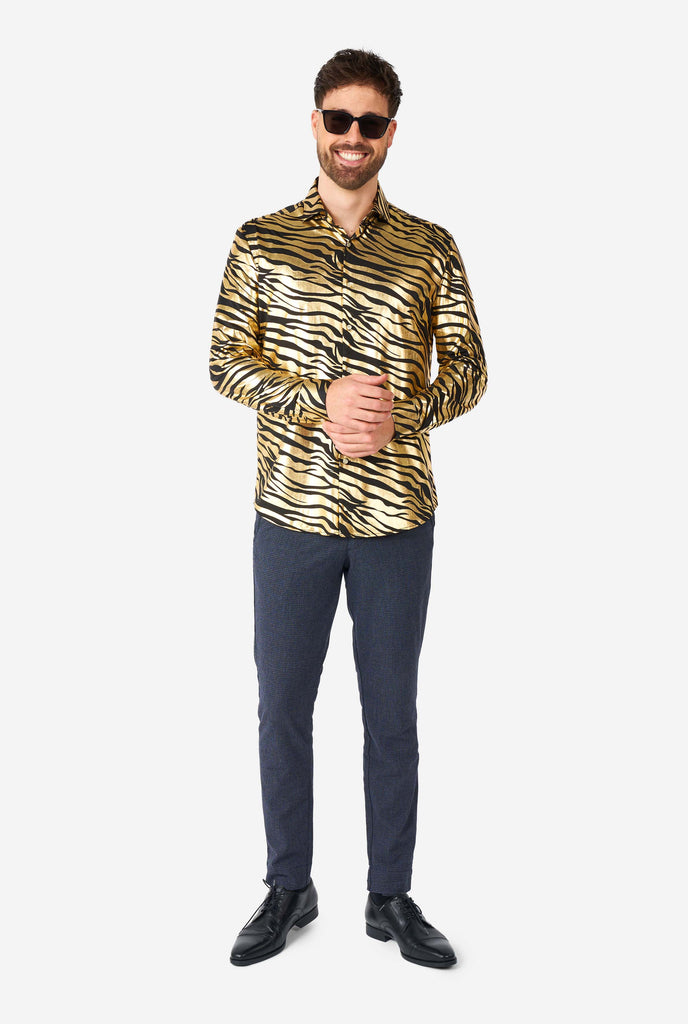 Man wearing golden dress shirt with tiger stripes