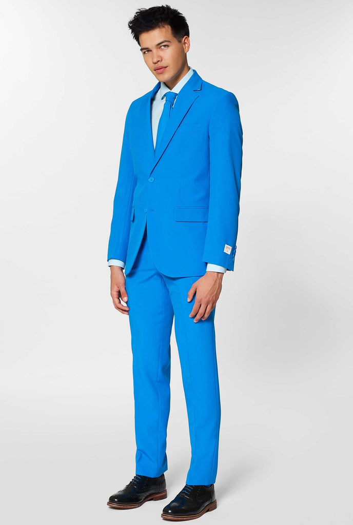 Man wearing blue men's suit