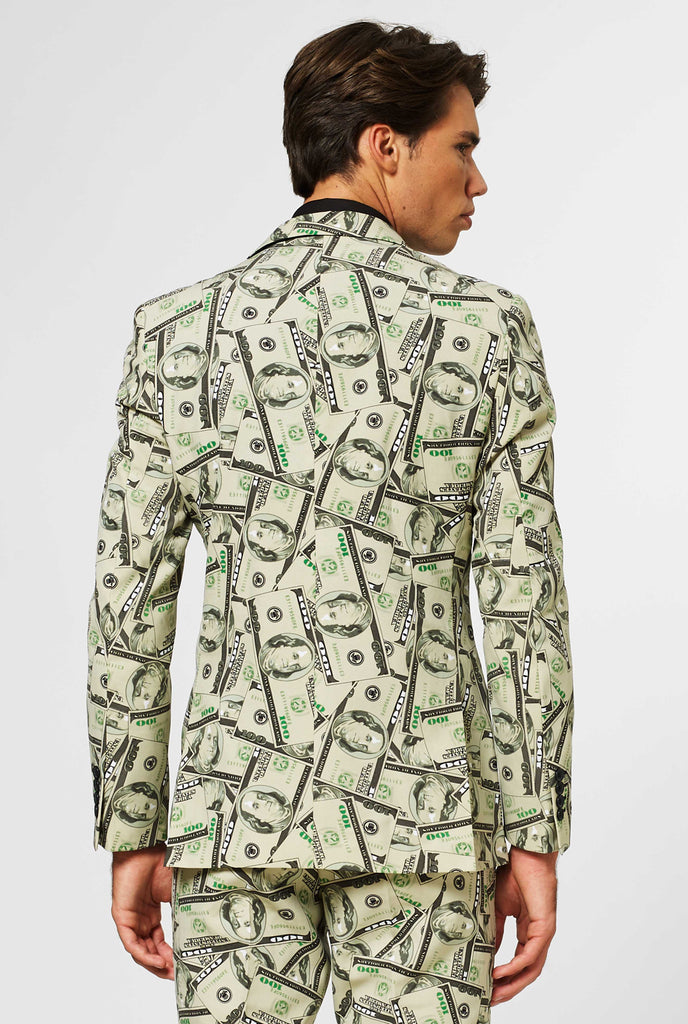 Man wearing men's suit with dollar, money print, view from the back