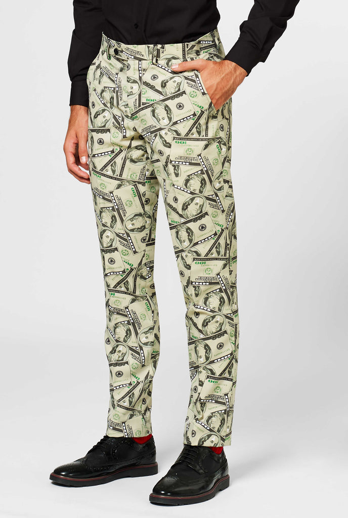 Man wearing men's suit with dollar, money print, pants close up