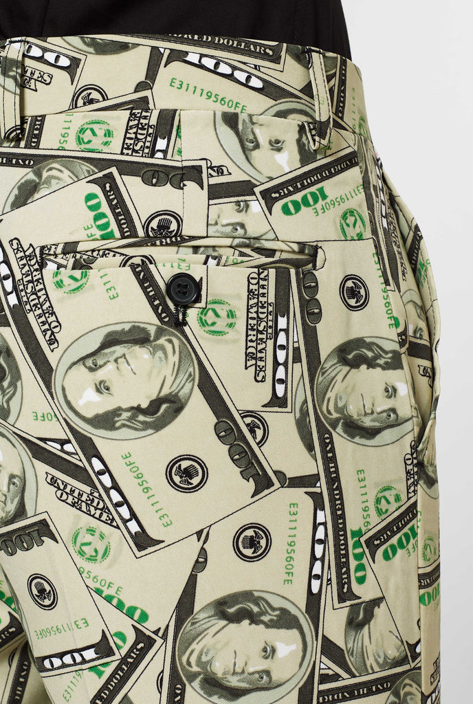 Man wearing men's suit with dollar, money print, pants close up