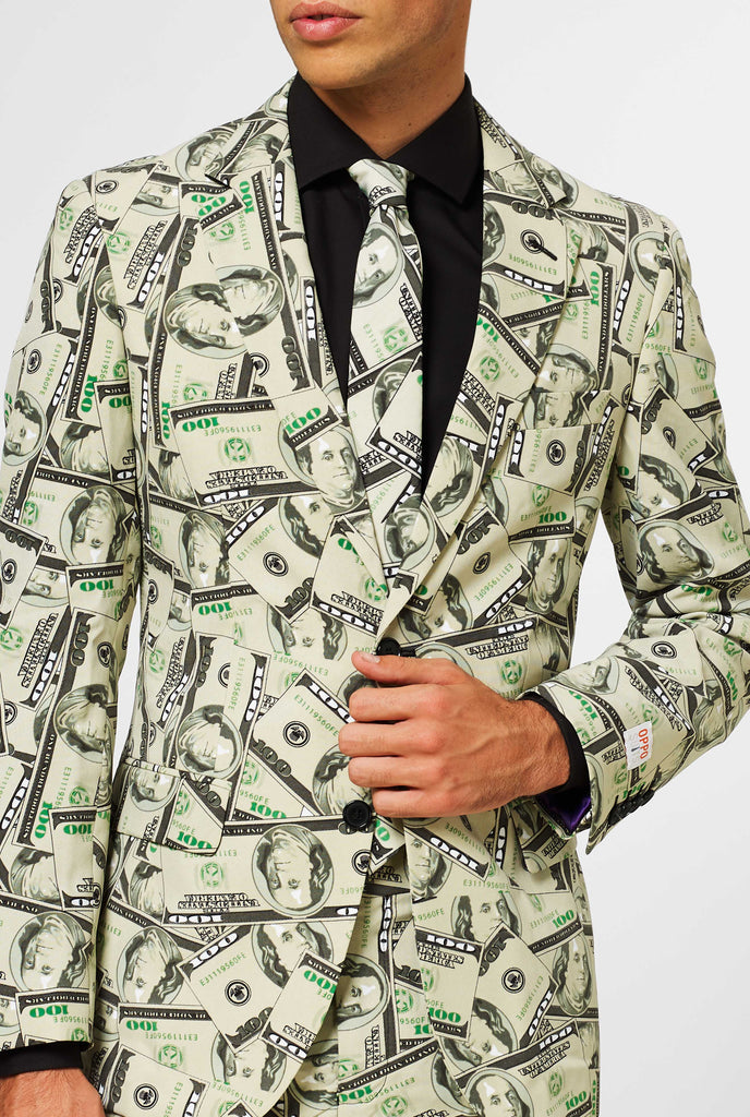 Man wearing men's suit with dollar, money print, close up