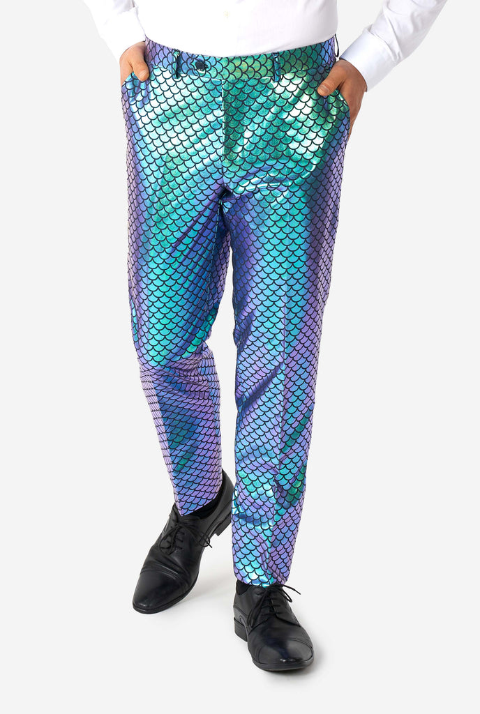 Man wearing blue fish scale motive suit, pants close up