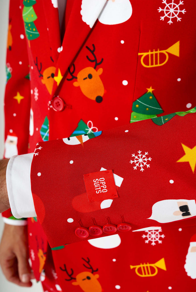 Man wearing red Christmas suit, close up sleeve