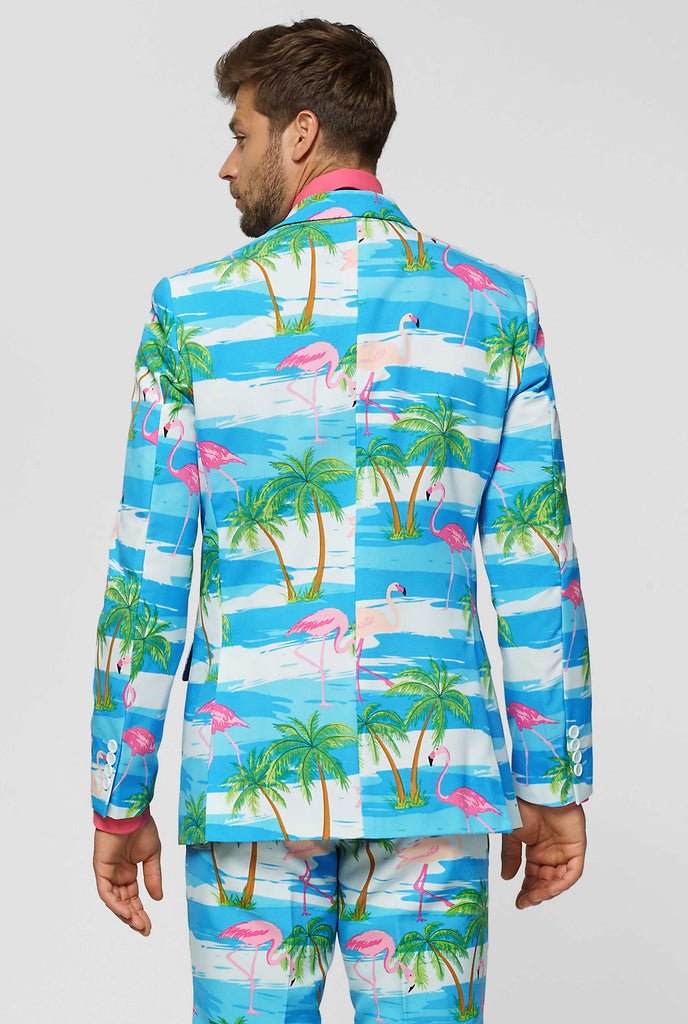 Blue and white suit with tropical flamingo print Flaminguy worn by man back side jacket