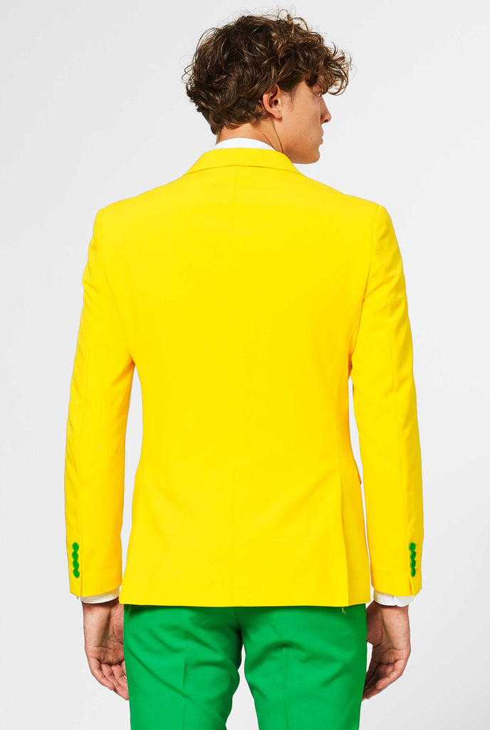 Man wearing green and yellow suit, view from the back