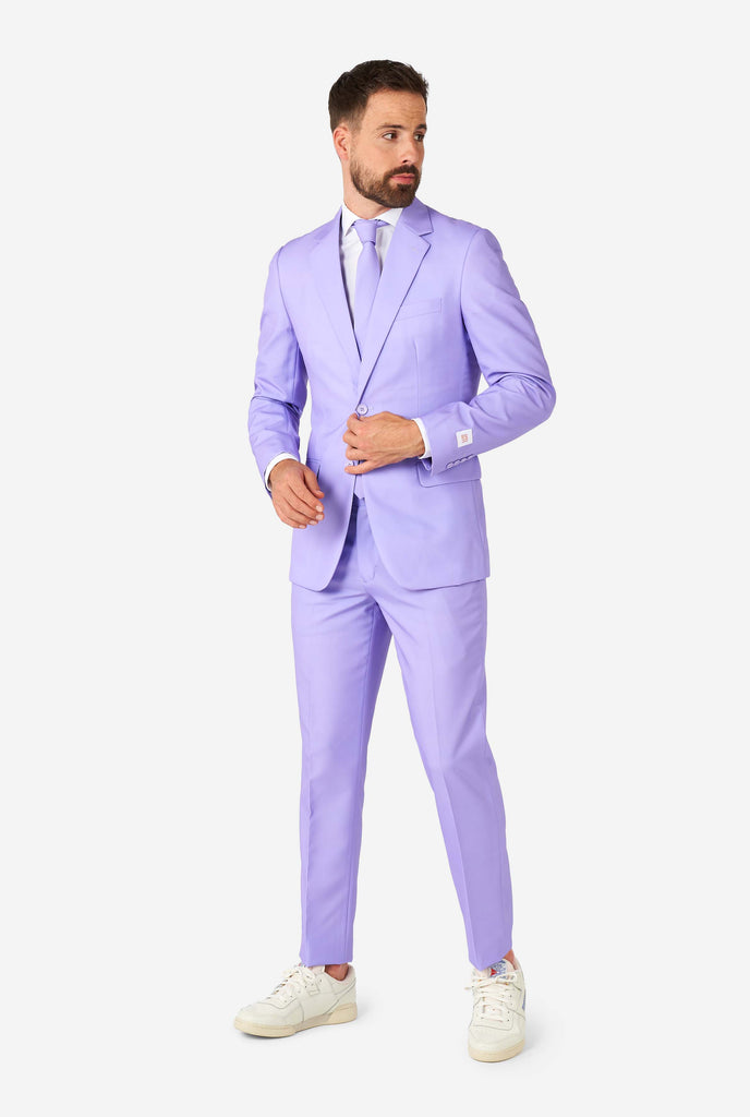 Man wearing lavender purple colored suit