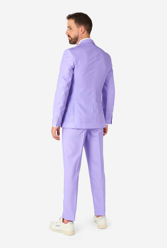 Man wearing lavender purple colored suit