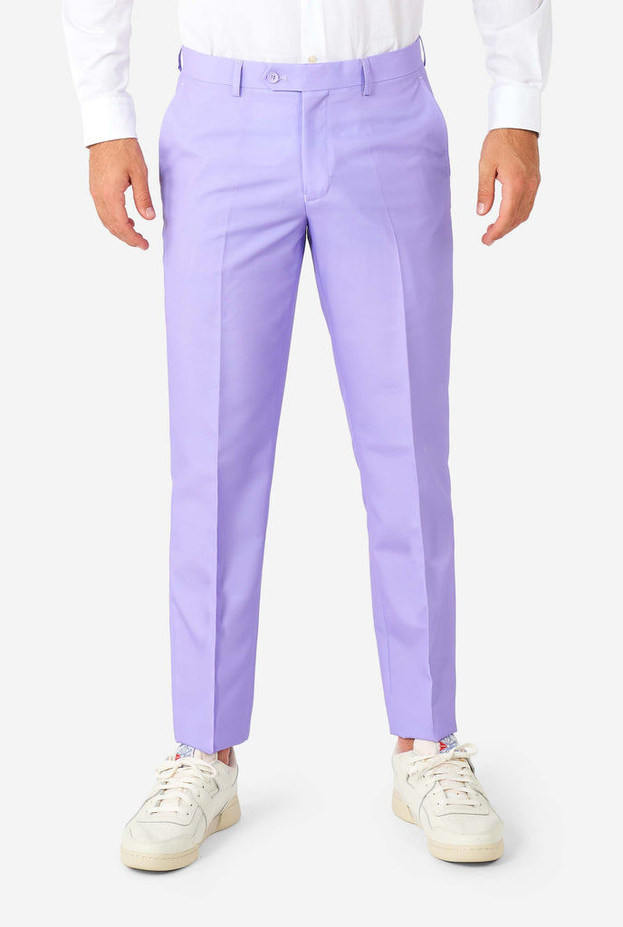 Man wearing lavender purple colored suit, pants view