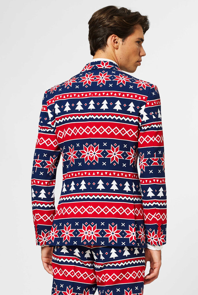 Nordic themed Christmas suit worn by man shown from behind