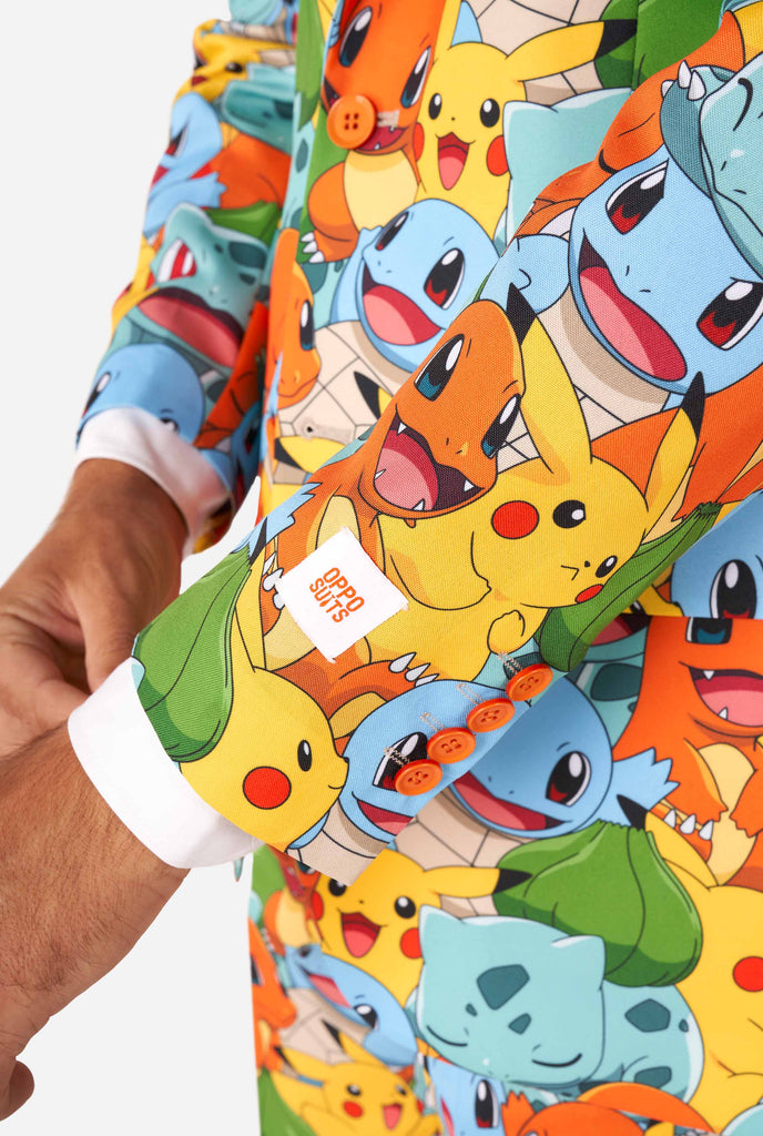 Man wearing suit with Pokémon, Pikachu print, sleeve close up