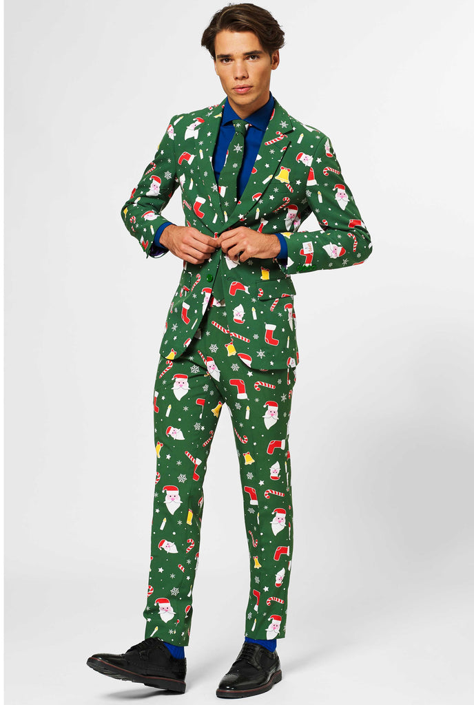 Man wearing green Christmas suit and blue dress shirt